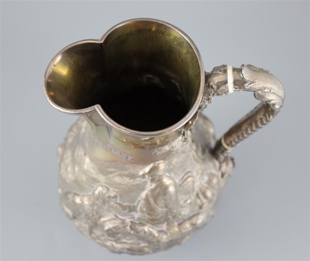 A large Victorian silver baluster hot water jug, by Robert Hennell IV,